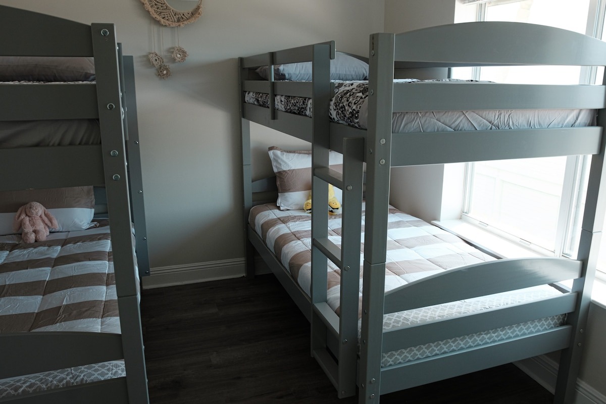 Bunk room setup for kid-friendly sleeping logistics.