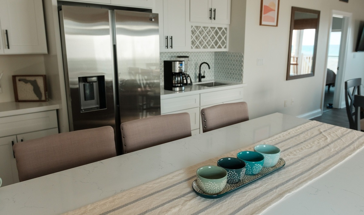 Open-plan living/dining perspective useful for group planning.