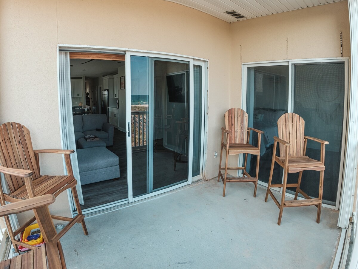 Balcony layout and seating context for outdoor use.